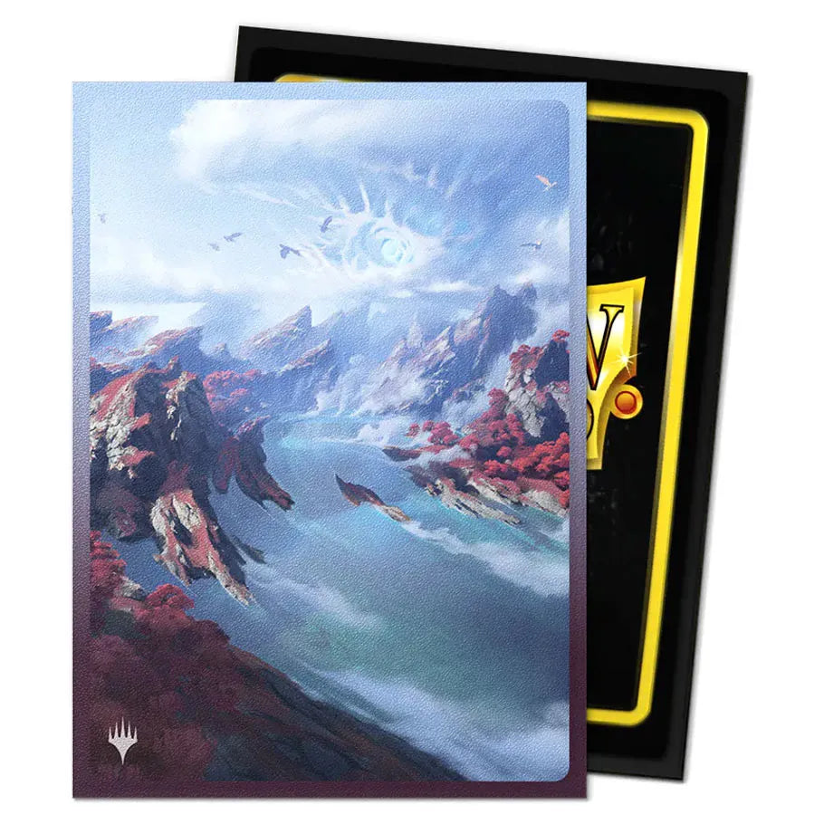 Dragon Shield Card Sleeve with a scenic design of mountains and water, displayed in a black and yellow card.