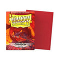 Dragon Shield Classic Crimson card sleeves, showing the illustrated retail box in front of a solid red envelope on a white background.